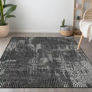 Photo of Black And Ivory Geometric Washable Indoor Outdoor Area Rug