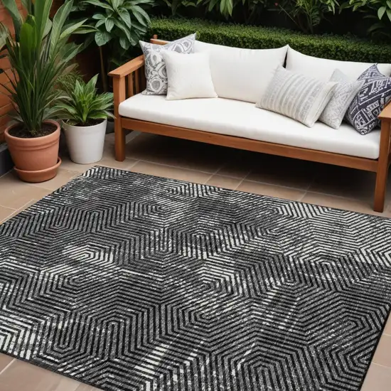 Black And Ivory Geometric Washable Indoor Outdoor Area Rug Photo 1