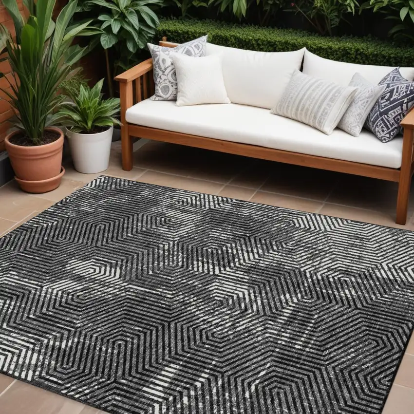 Black And Ivory Geometric Washable Indoor Outdoor Area Rug Photo 1