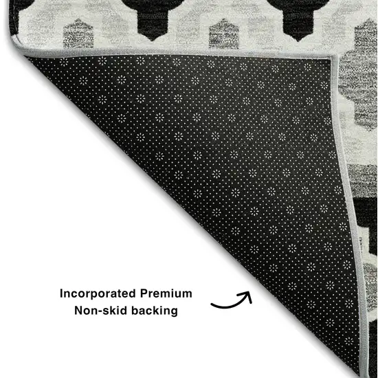 Black And Ivory Ikat Washable Area Rug With UV Protection Photo 7