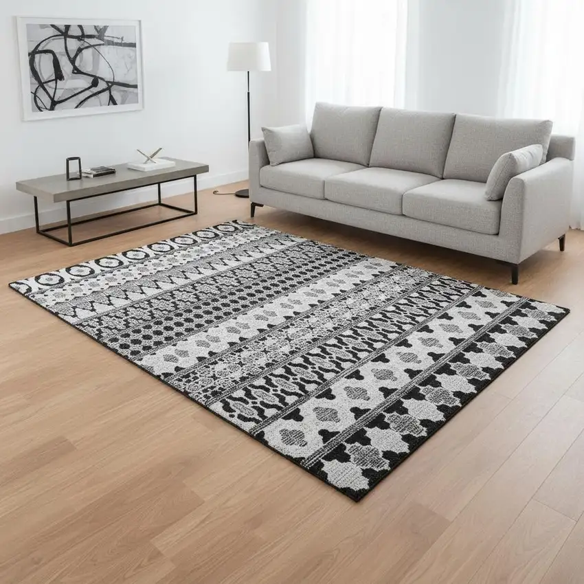 Black And Ivory Ikat Washable Area Rug With UV Protection Photo 2