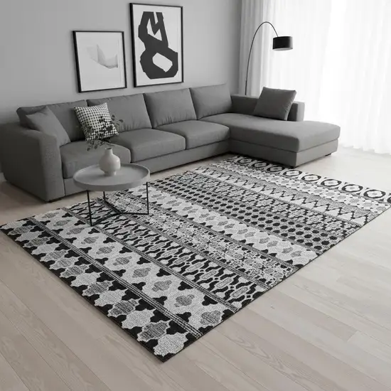 Black And Ivory Ikat Washable Area Rug With UV Protection Photo 2
