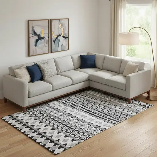 Black And Ivory Ikat Washable Area Rug With UV Protection Photo 1