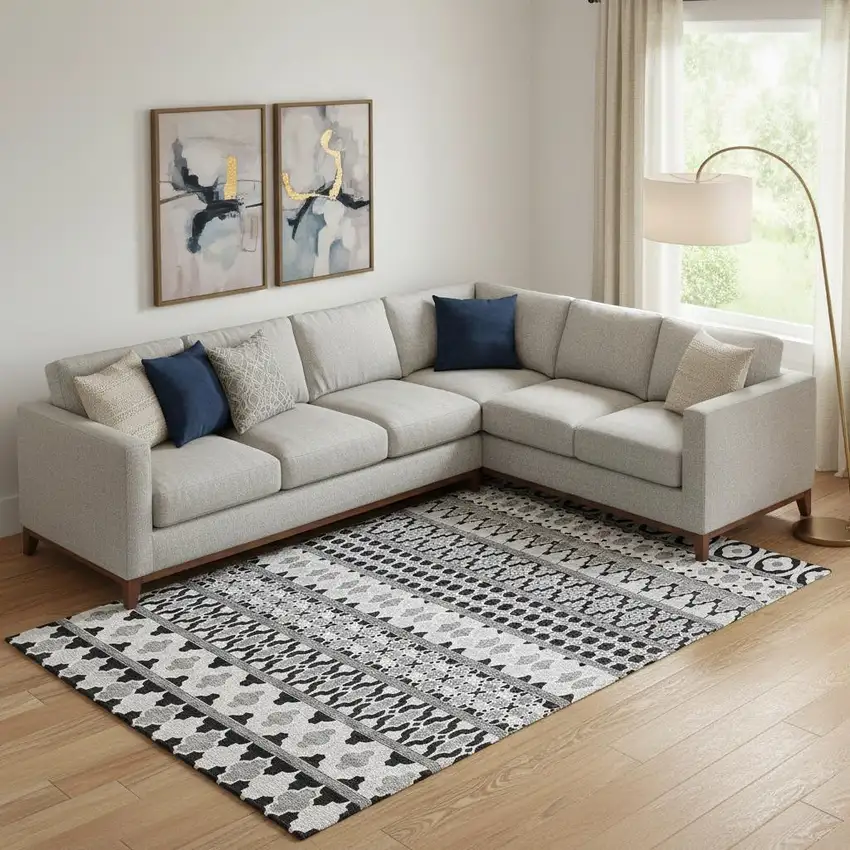 Black And Ivory Ikat Washable Area Rug With UV Protection Photo 1