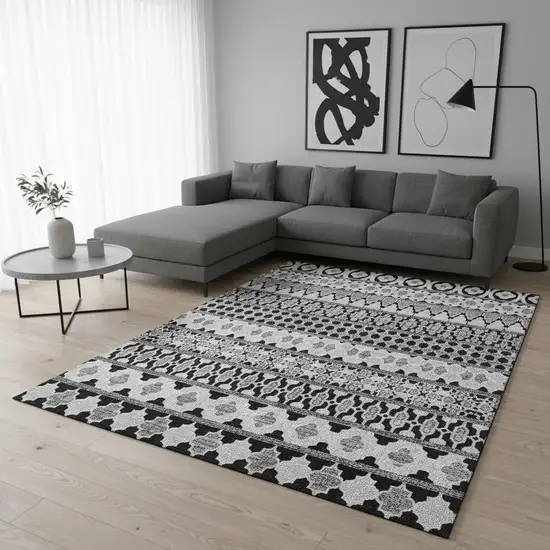 Black And Ivory Ikat Washable Area Rug With UV Protection Photo 2