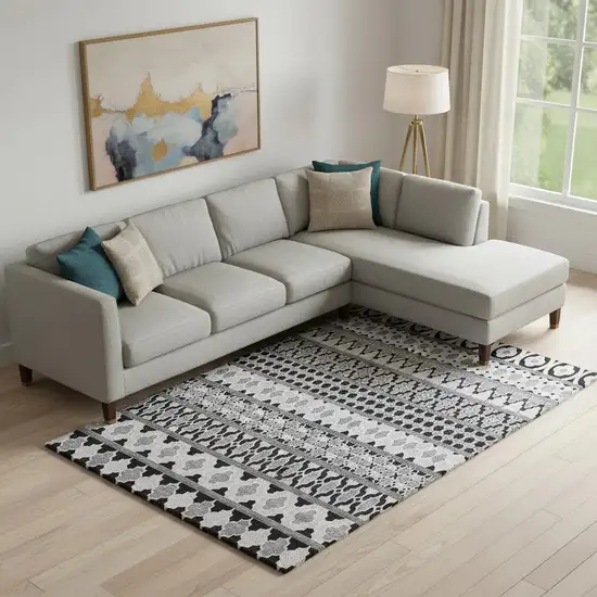 Black And Ivory Ikat Washable Area Rug With UV Protection Photo 1