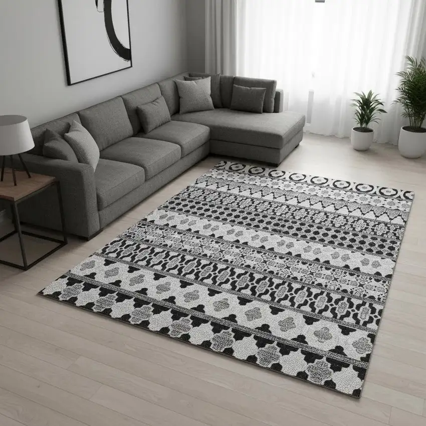 Black And Ivory Ikat Washable Area Rug With UV Protection Photo 2