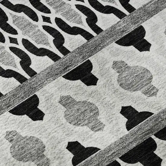 Black And Ivory Ikat Washable Area Rug With UV Protection Photo 8