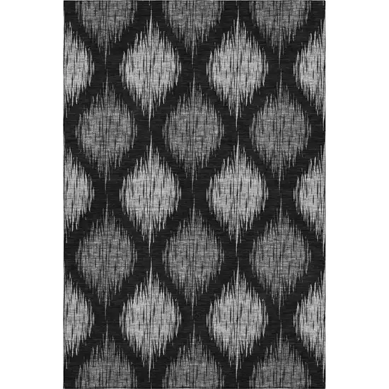 Black And Ivory Ikat Washable Area Rug With UV Protection Photo 1
