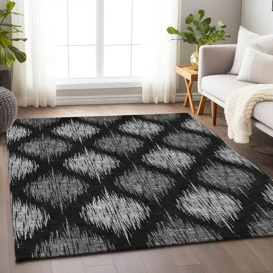 Black And Ivory Ikat Washable Area Rug With UV Protection Photo 6