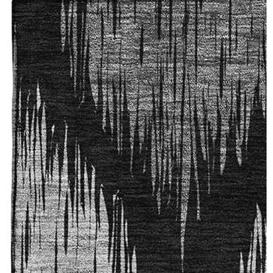 Black And Ivory Ikat Washable Area Rug With UV Protection Photo 3