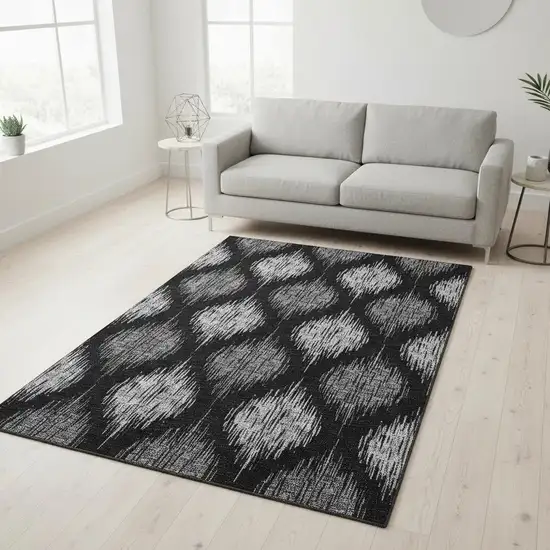 Black And Ivory Ikat Washable Area Rug With UV Protection Photo 2