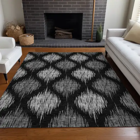 Black And Ivory Ikat Washable Area Rug With UV Protection Photo 5