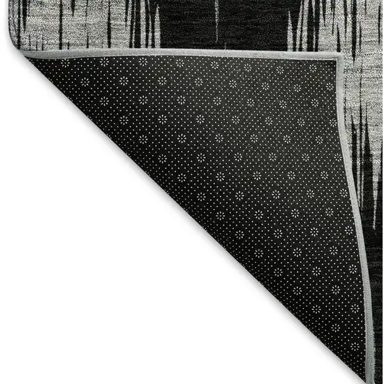 Black And Ivory Ikat Washable Area Rug With UV Protection Photo 8