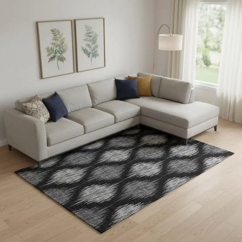 Black And Ivory Ikat Washable Area Rug With UV Protection Photo 1
