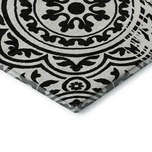 Photo of Black And Ivory Medallion Washable Area Rug With UV Protection