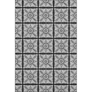Photo of Black And Ivory Medallion Washable Area Rug With UV Protection