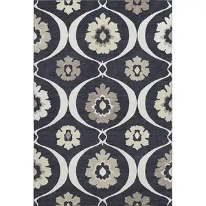 Photo of Black And Ivory Medallion Washable Area Rug With UV Protection