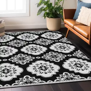 Photo of Black And Ivory Medallion Washable Indoor Outdoor Area Rug