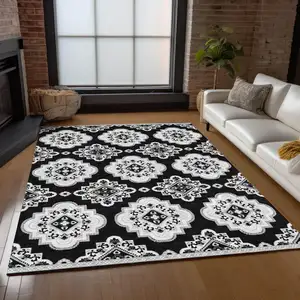 Photo of Black And Ivory Medallion Washable Indoor Outdoor Area Rug