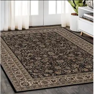 Photo of Black And Ivory Oriental Area Rug
