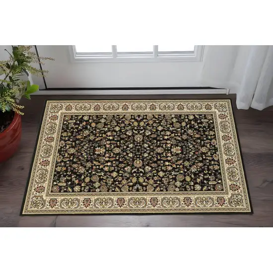 2' X 4' Black And Ivory Oriental Power Loom Stain Resistant Area Rug Photo 1