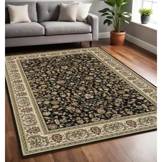Black And Ivory Oriental Power Loom Stain Resistant Area Rug Photo 1