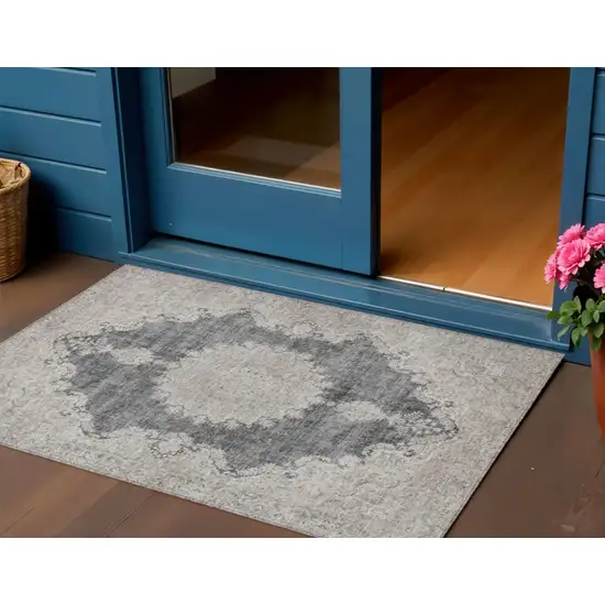 Black And Ivory Oriental Washable Indoor Outdoor Area Rug Photo 1