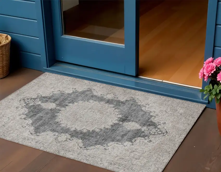 Black And Ivory Oriental Washable Indoor Outdoor Area Rug Photo 1
