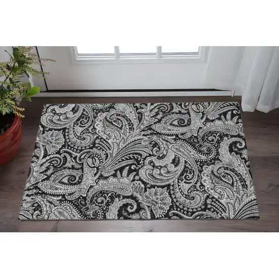 Black And Ivory Paisley Washable Area Rug With UV Protection Photo 2