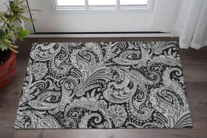 Black And Ivory Paisley Washable Area Rug With UV Protection Photo 2