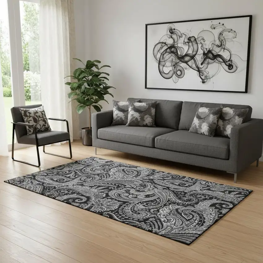 Black And Ivory Paisley Washable Area Rug With UV Protection Photo 1