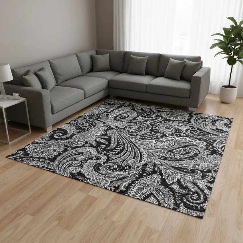 Black And Ivory Paisley Washable Area Rug With UV Protection Photo 1