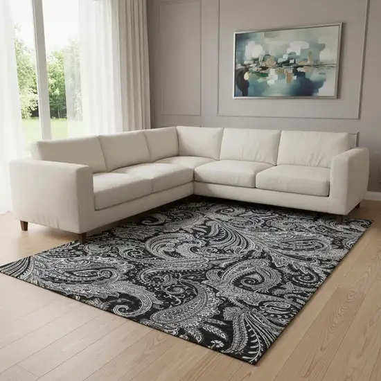 Black And Ivory Paisley Washable Area Rug With UV Protection Photo 1
