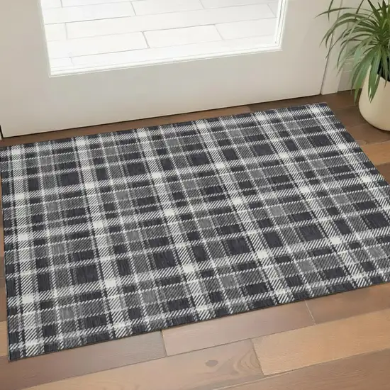 Black And Ivory Plaid Washable Area Rug With UV Protection Photo 1