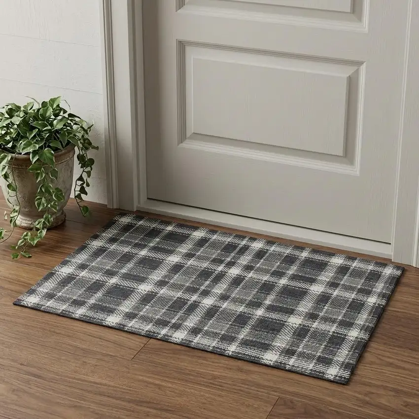 Black And Ivory Plaid Washable Area Rug With UV Protection Photo 1