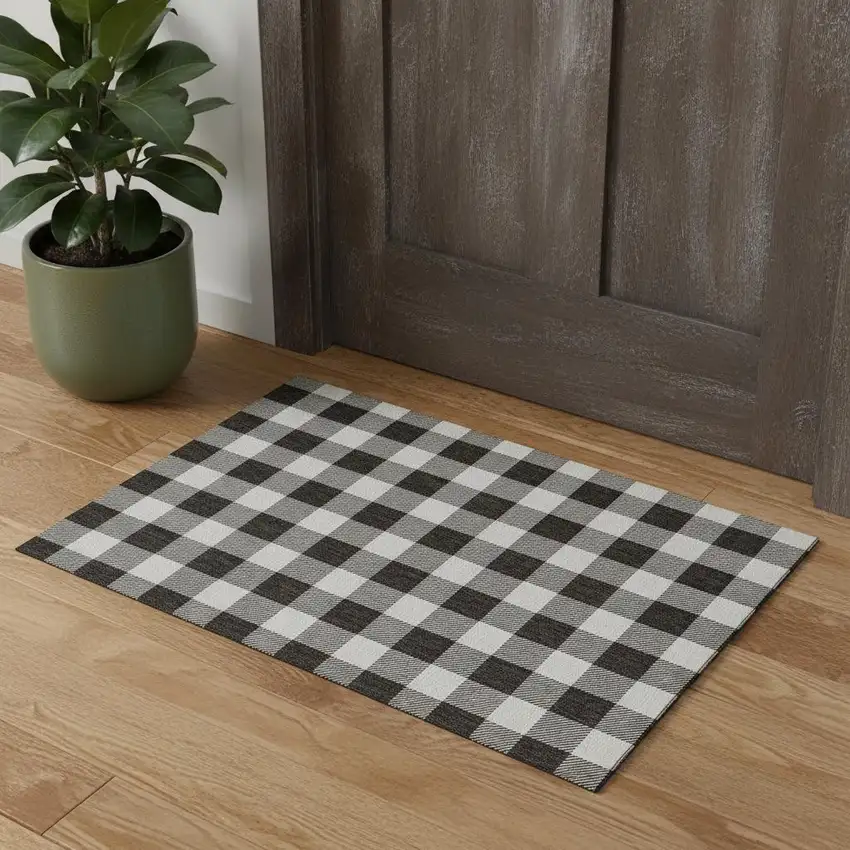 Black And Ivory Plaid Washable Area Rug With UV Protection Photo 1