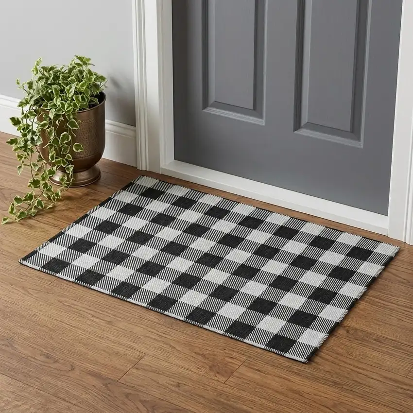 Black And Ivory Plaid Washable Area Rug With UV Protection Photo 1
