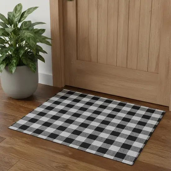 Black And Ivory Plaid Washable Area Rug With UV Protection Photo 1