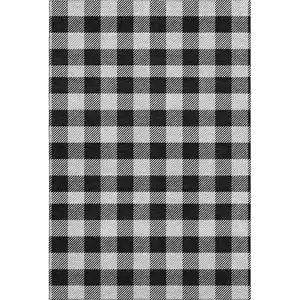 Photo of Black And Ivory Plaid Washable Area Rug With UV Protection