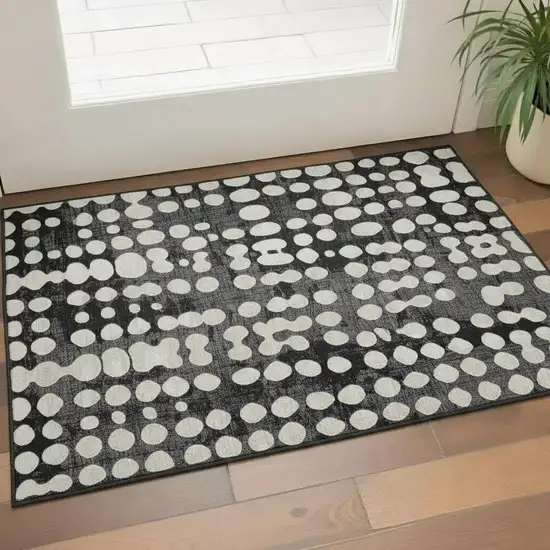 Black And Ivory Polka Dot Washable Area Rug With UV Protection Photo 1
