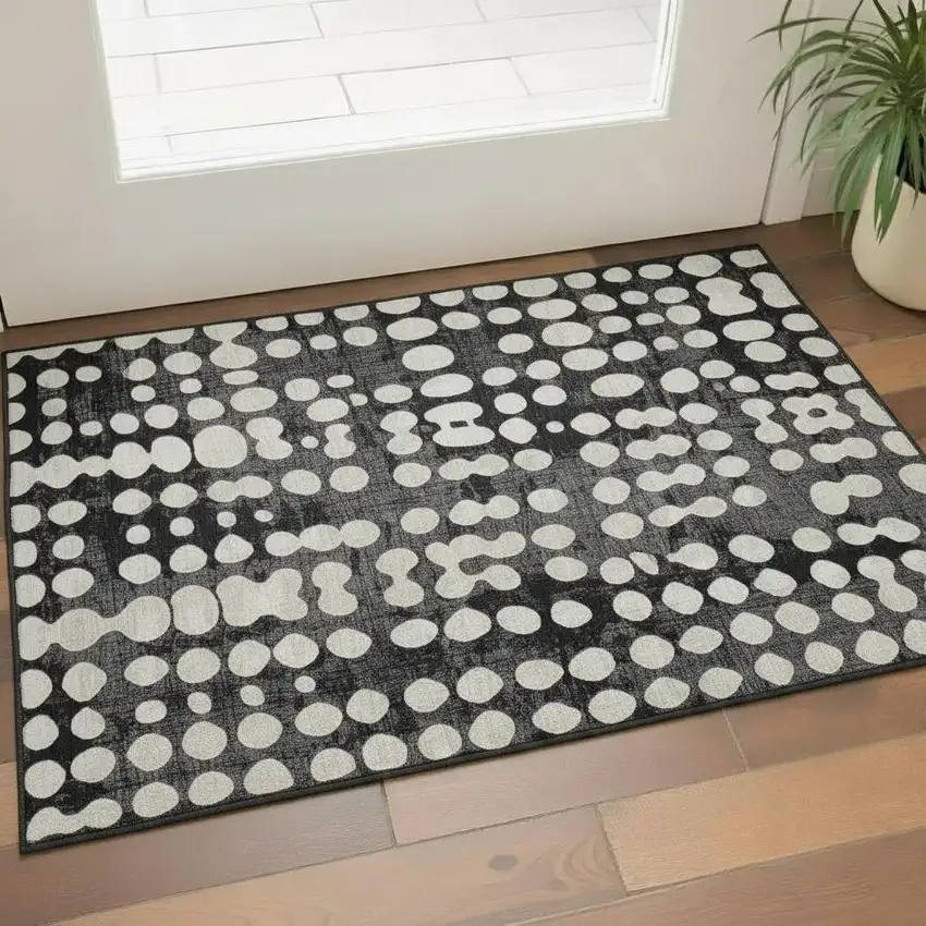 Black And Ivory Polka Dot Washable Area Rug With UV Protection Photo 1