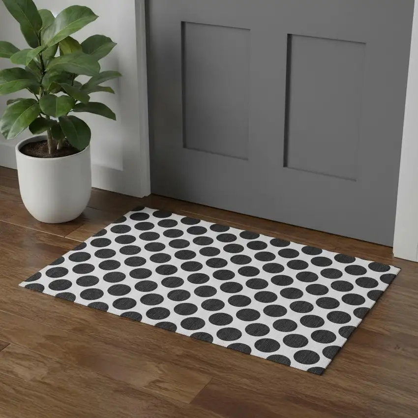 Black And Ivory Polka Dot Washable Area Rug With UV Protection Photo 1