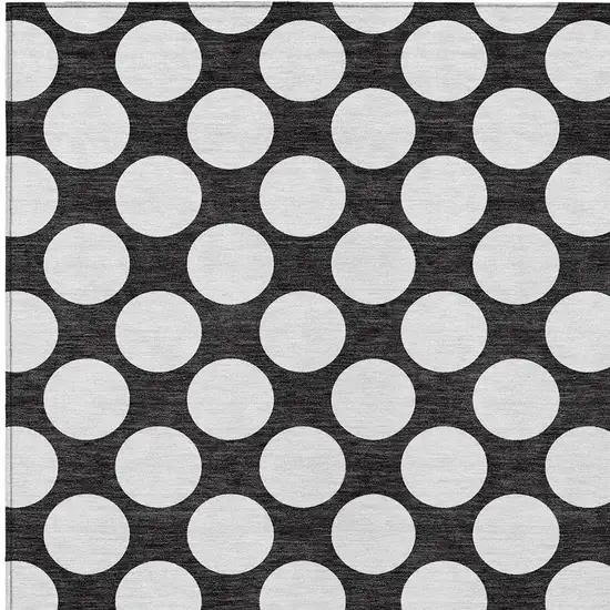 Black And Ivory Polka Dot Washable Indoor Outdoor Area Rug Photo 6