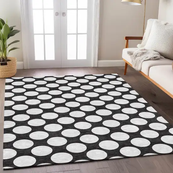 Black And Ivory Polka Dot Washable Indoor Outdoor Area Rug Photo 9
