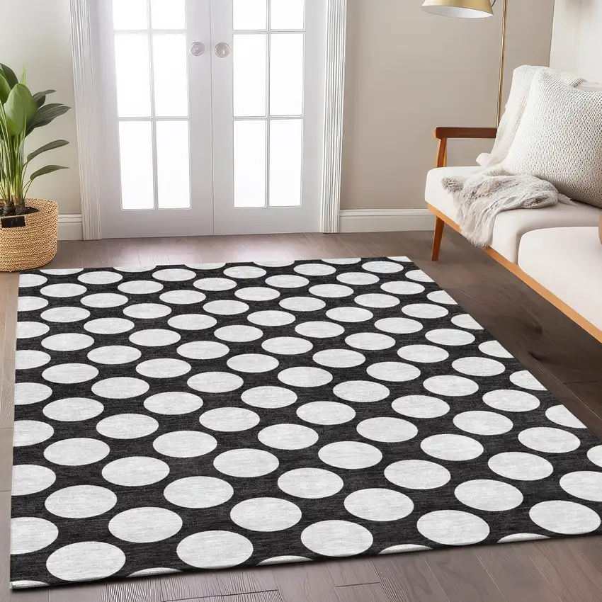 Black And Ivory Polka Dot Washable Indoor Outdoor Area Rug Photo 9