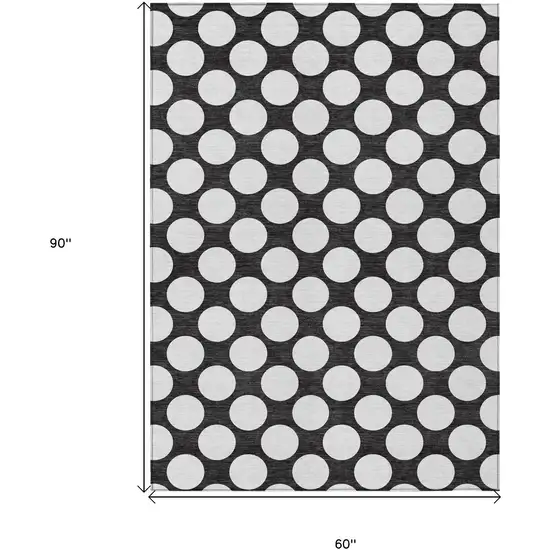 Black And Ivory Polka Dot Washable Indoor Outdoor Area Rug Photo 3