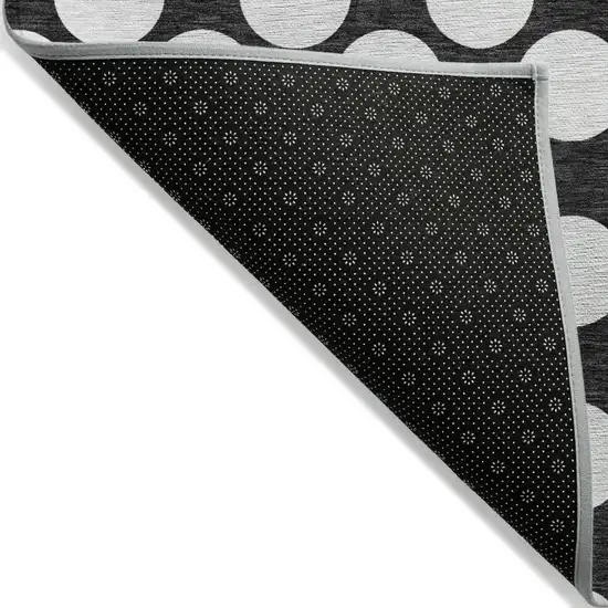Black And Ivory Polka Dot Washable Indoor Outdoor Area Rug Photo 4
