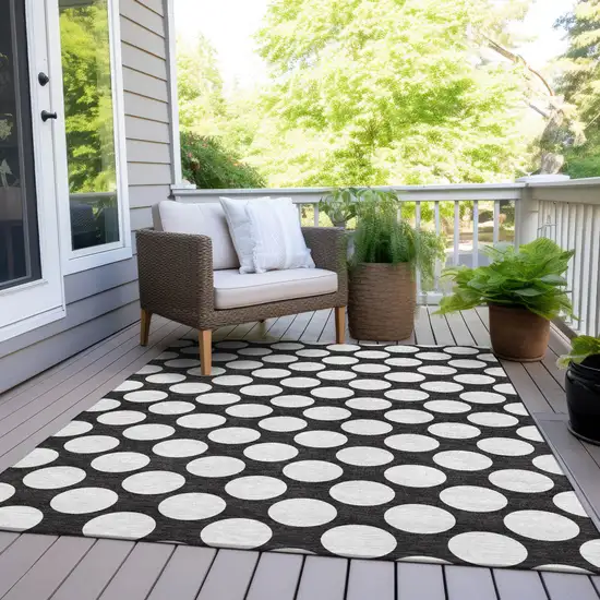 Black And Ivory Polka Dot Washable Indoor Outdoor Area Rug Photo 9