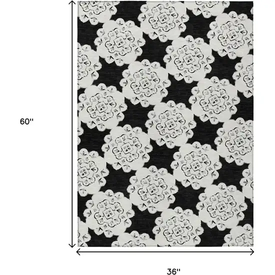 Black And Ivory Quatrefoil Washable Indoor Outdoor Area Rug Photo 3